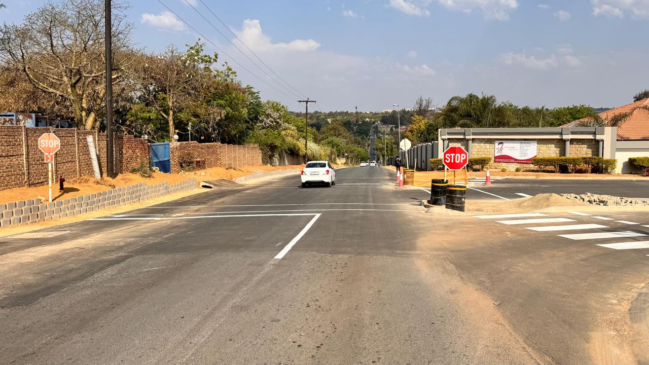 Long view down the completed upgraded road at Waterfall Manor