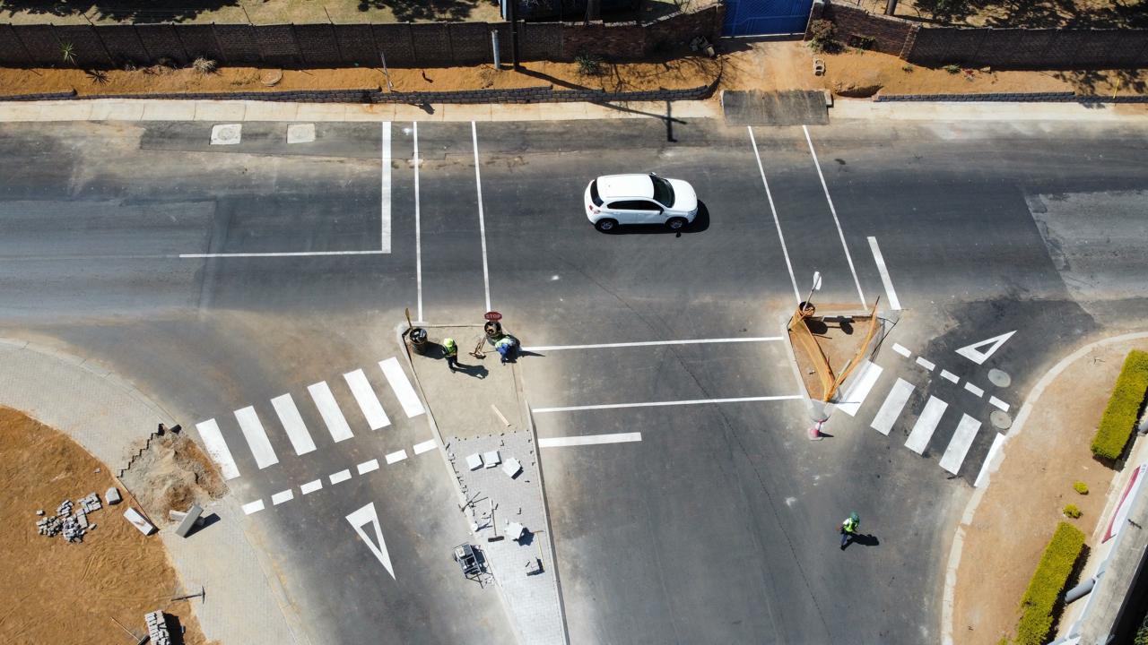 Aerial view of new pedestrian crossings and traffic islands at Waterfall Manor